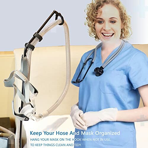 Nurse with CPAP mask and hose holder