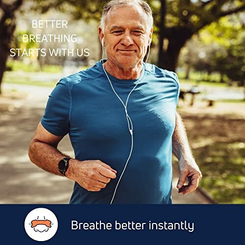 Older man jogging in park wearing headphones, promoting better breathing.